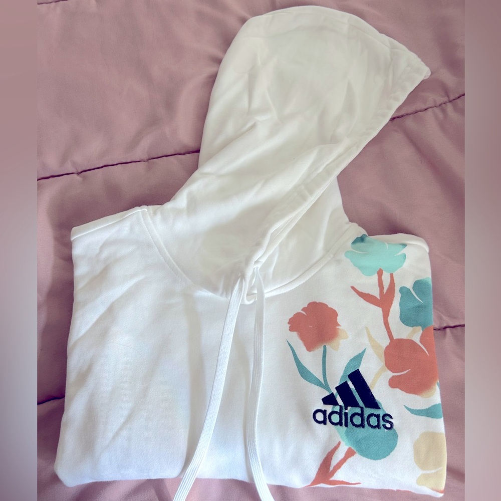 A comfortable fleece hooded sweatshirt crafted for sporty style, adidas size L